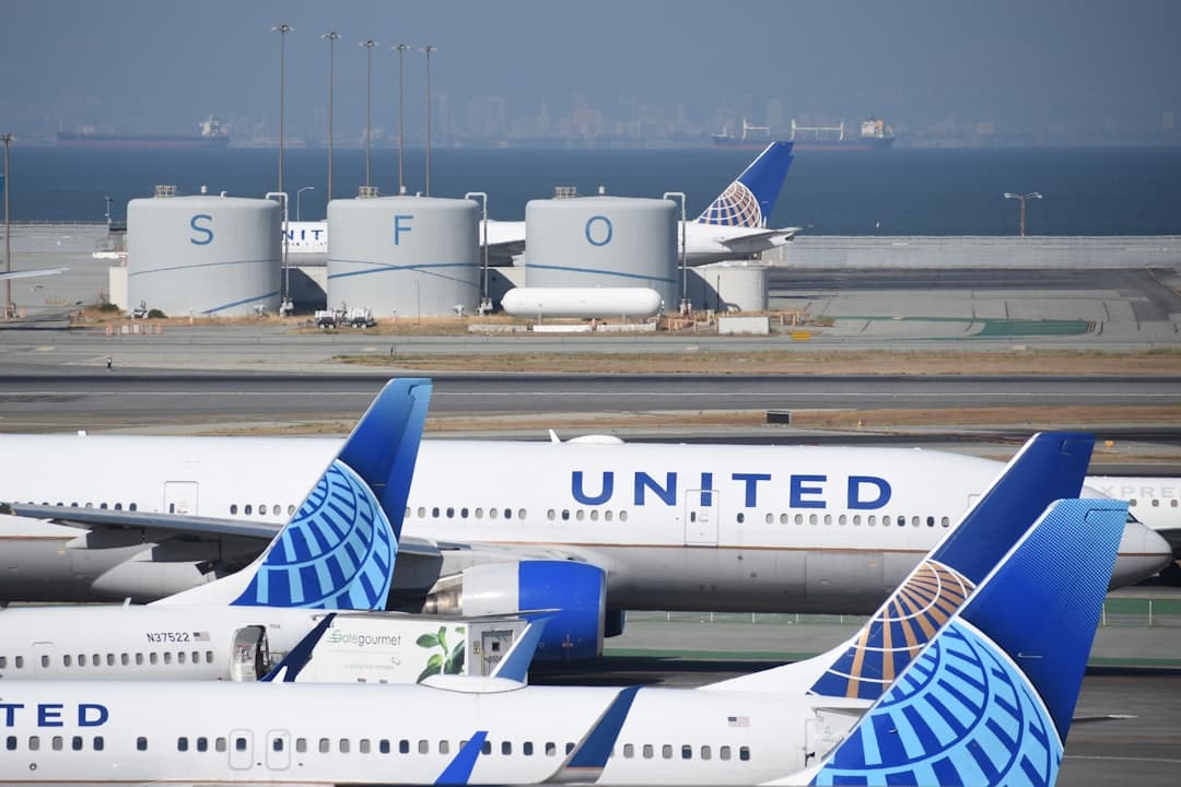 a bunch of airplanes that are on a runway — Photo by David Syphers on Unsplash